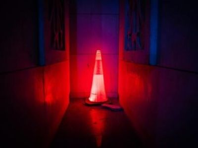 Red light with a traffic cone