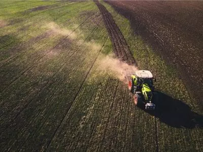 Tractor driving through a field